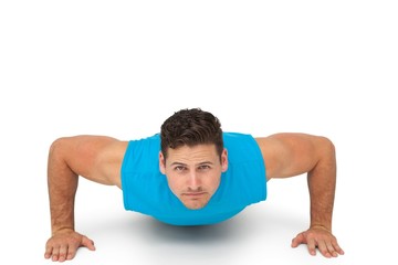 Portrait of a determined man doing push ups