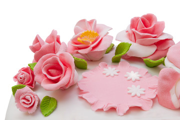 Obraz na płótnie Canvas Festive marzipan cake decorated with pink roses.