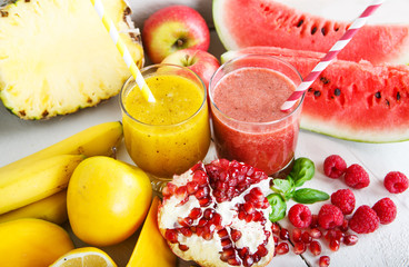 Fresh organic red and yellow smoothie with apple, watermelon, po