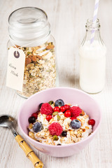 Fresh yoghurt with home made cereals and muesli, fresh raspberry