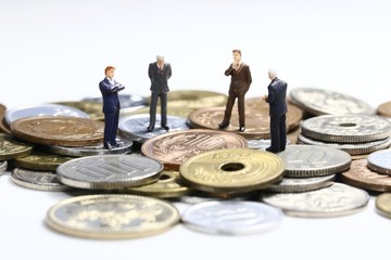 硬貨とビジネスマン