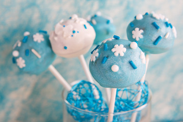 Fototapeta premium Wedding cake pops in white and soft blue.