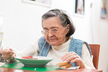 Old woman eating