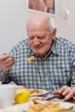 Old man eating