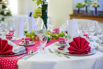 Elegant table set  for wedding or event party in pink with dots.