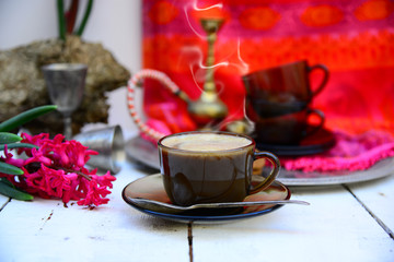 Coffee time in Eastern ethnic style and fucshia