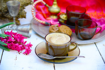 Coffee time in Eastern ethnic style and fucshia