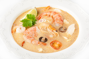 Tom Yam soup with coconut milk. Thai spicy soup. Seafood