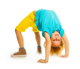 Happy boy showing acrobatic trick