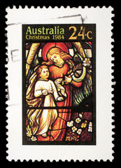 Christmas stamp printed in Australia shows Angel with child
