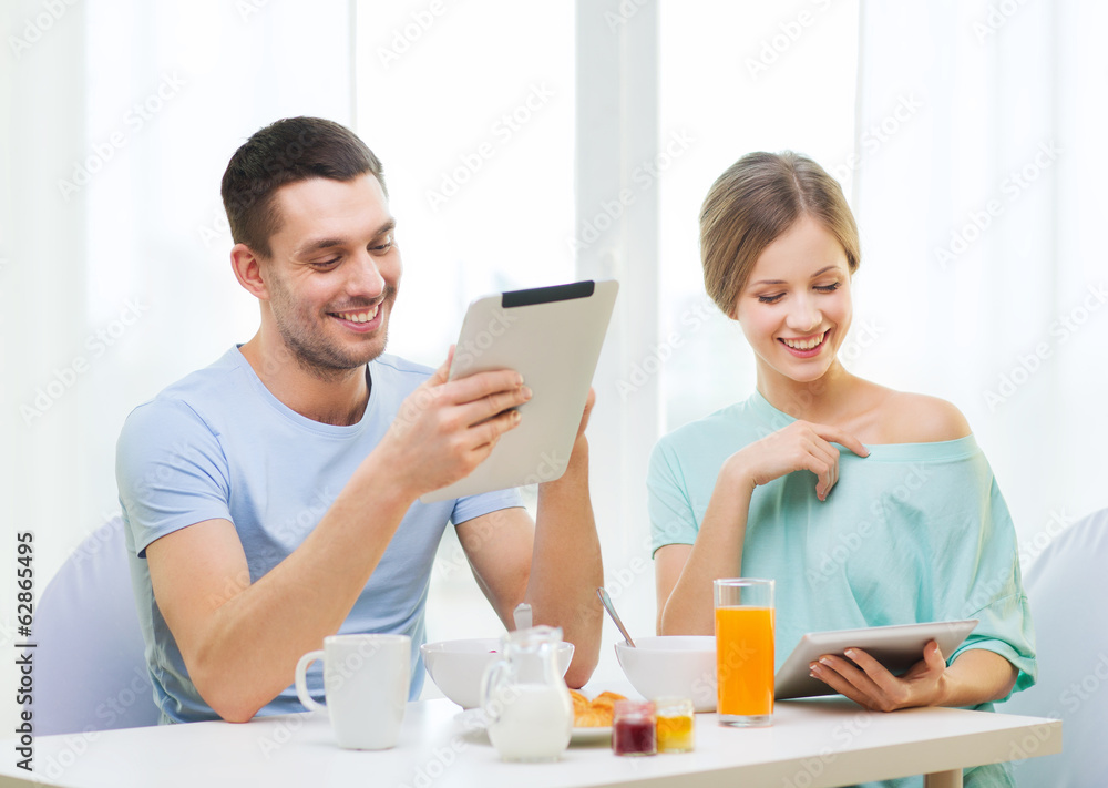 Sticker smiling couple with tablet pc reading news