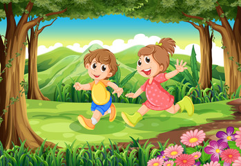 Obraz na płótnie Canvas Children running at the woods