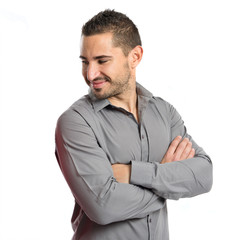 Handsome man with arms crossed over isolated background