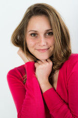 portrait of a cheerful young women on a white backgroung