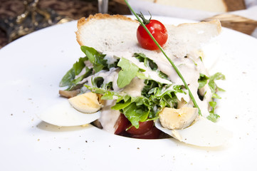 egg salad and vegetables on the table in a restaurant