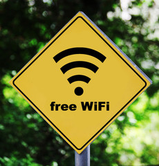 Yellow road signoutdoor with wifi pictogram