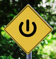 Yellow label with power button pictogram