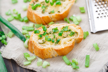 Bruschetta with cheese and scallion
