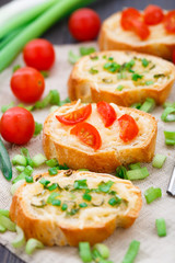 Bruschetta with cherry tomatoes and scallion
