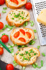 Bruschetta with cherry tomatoes and scallion