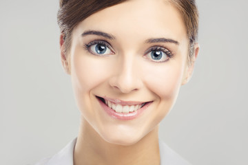 Naklejka premium Smiling young woman