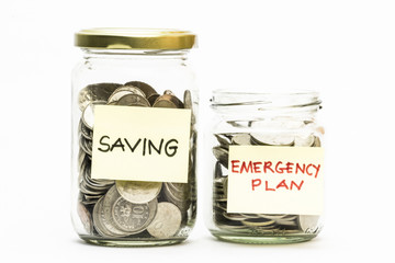 Coins in jar with emergency plan and emergency plan label