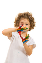 Little girl with colorful hands
