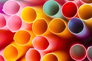 Colorful drinking straws close-up background