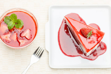 Rainbow cheese cake with fresh strawberries and strawberries che