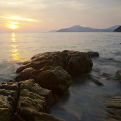 Long exposure sunset at the shore in Teluk Batik, Perak, Malaysi