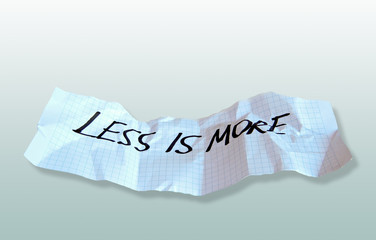 word less is more on torned paper