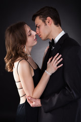 Side View Of Couple Kissing