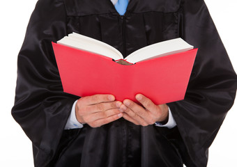 Judge Holding Statute Book