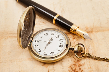 fountain pen and pocketwatch