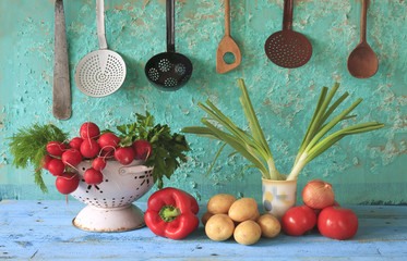 various vegetables and  retro kitchen utensils