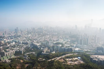 Zelfklevend Fotobehang Polluted Hong Kong cityscape seen from Beacon Hill, Kowloon © Stripped Pixel