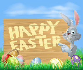 Happy Easter bunny pointing