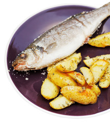 labrax fish baked in salt and fried potato