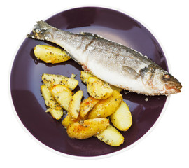 above view of fish and fried potatoes on plate