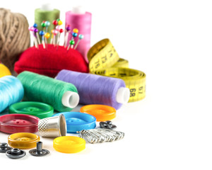 Tools for sewing: measurement, button, thimble, pins