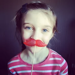 Zelfklevend Fotobehang girl with candy moustache © Alinute