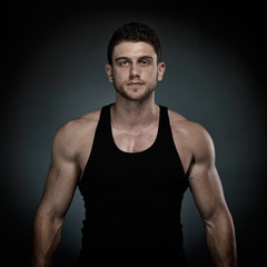 Fototapeta premium athletic young man portrait in studio
