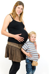 Pregnant mother with a little boy brother