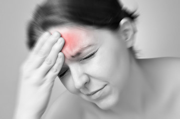 Young woman having migraine