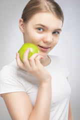 Caucasian Teenager Girl Holding Green Apple