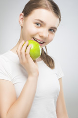 Caucasian Teenager Girl Holding Green Apple