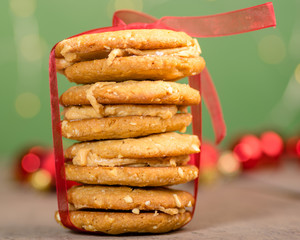 Stack of Christmas Cookies tied with red ribbon