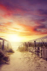 Walkway to beach at sunrise