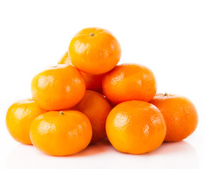 ripe juicy tangerine on a white background.  Clementine Mandarin