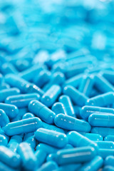 blue brown capsule pills medicine antibiotic